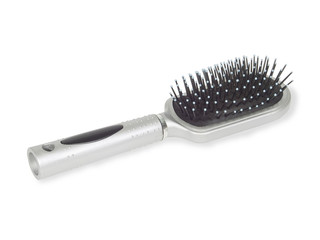 Massage hairbrush isolated on a white background