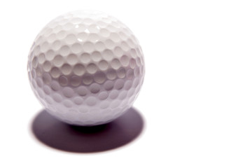 Golf ball over white