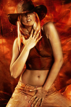 attractive blond dancing, red and golden background