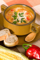 Bowl of hot delicious corn and red chilli chowder