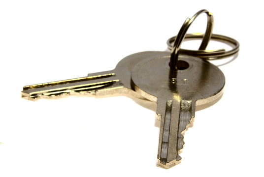 bounch of keys from steel on a white background