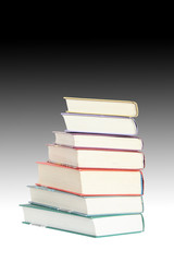 Isolated books standing on gradient background