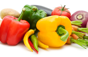 colorful paprika and vegetables on white background
