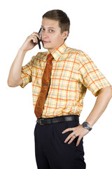 Young, elegant European businessman, talking on phone