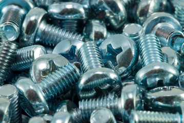 Close-up shiny chrome metal screws