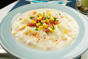 Freshly prepared ham corn and potato chowder with paprika