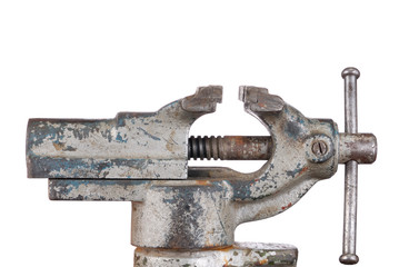 Old rusty bench vise isolated on white background