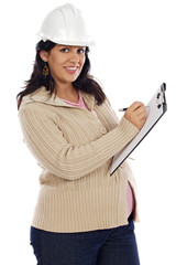 Attractive pregnant engineer on a over white background
