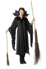 nice witch in black dress with 2 brooms one big one little