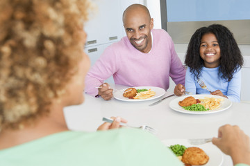 Family Eating A meal,mealtime Together