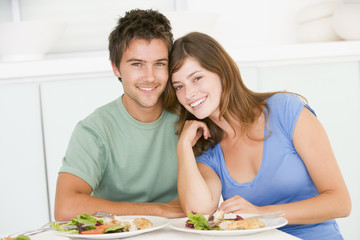 Young Couple Enjoying meal,mealtime Together