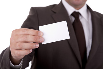 Businessman showing his business card, focus on fingers