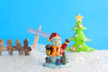 ceramic decorative christmas snowman in a field