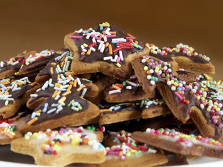 Pile of gingerbread xmas cakes in different shapes