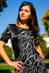 Pretty young girl in a autumn park