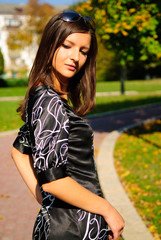 Pretty young girl in a autumn park