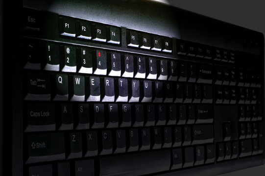 Black keyboard  with red dolar