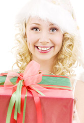 picture of cheerful santa helper girl with gift box
