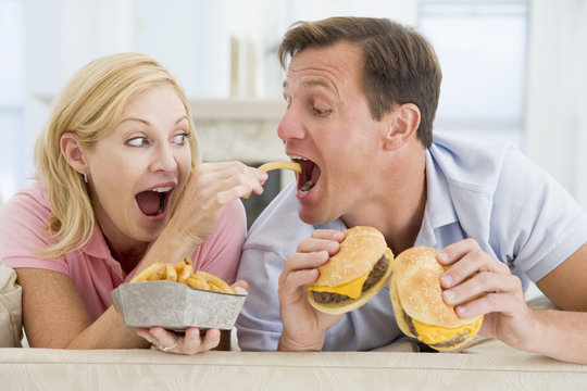 Couple Enjoying Burgers Together