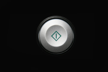 round button start on a black background