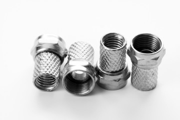 lots of sat plugs on white background