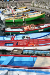 Fototapeta na wymiar Colourful Boats along Lake Garda Italy