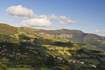 Naklejka premium Rural landscape with cloudy sky in North of Spain