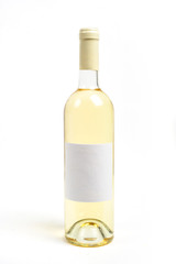 Close up of a bottle of white wine on white background