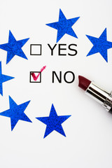 words yes and no with lipstick and blue stars, voting