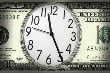 close up shot of a clock in  100 American dollar