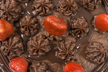 Top view of Chocolate Cake with strawberries .