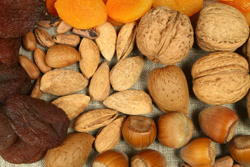 Walnuts, hazelnuts, pine nuts, dried peach and almonds.