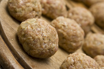 Round burgers made of pork minced meat