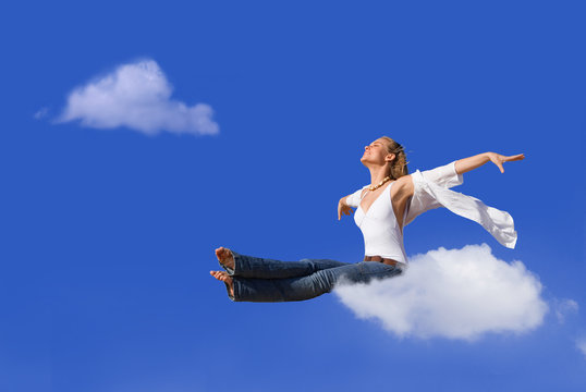 flight concept woman traveling on cloud