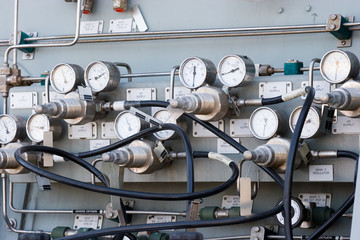 Gauges and dials for air supply to scuba tanks on a naval vessel