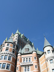 Fototapeta na wymiar the chateau frontenac quebec canada against blue sky