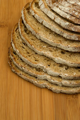 sliced bread on wooden background