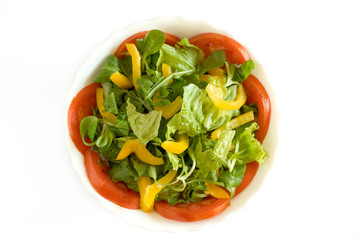 Bowl with mixed salad on white background
