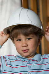 The kid in a building helmet
