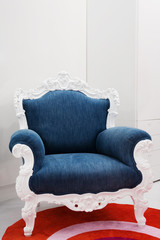 Armchair with a jeans fabric in a modern apartment