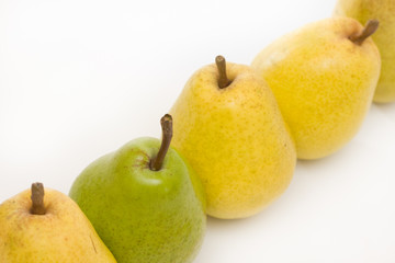 yellow and green pears in a row