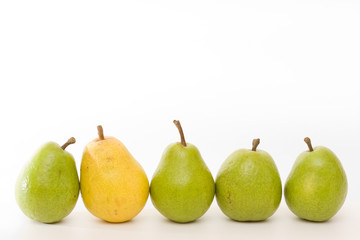 yellow and green pears in a row
