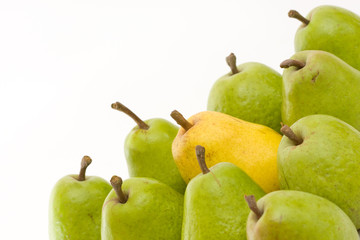 yellow and green pears on white with copy space
