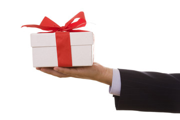 a businessman offering a gift to you (selective focus)