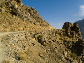 Path in the Atlas mountain, Morocco. Sunny summer day.