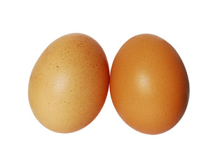 two eggs over white background