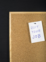 Quit your job message on office cork board. Employment concept
