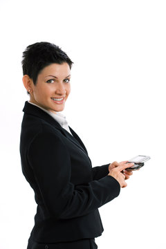 Happy businesswoman using mobile phone,