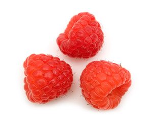three raspberry on white background