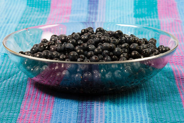 food series: ripe bilberries in the glass bowl